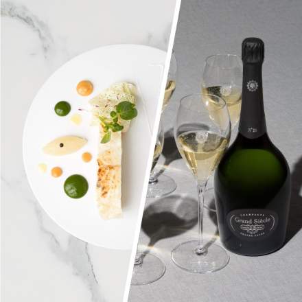 Assiette gastronomique avec poisson et sauces colorées à gauche, bouteille de champagne Grand Siècle et verres remplis à droite – Fayet Hospitality