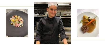 Personne portant une tenue professionnelle noire dans une cuisine moderne avec étagères métalliques et carrelage mural sombre – Fayet Hospitality